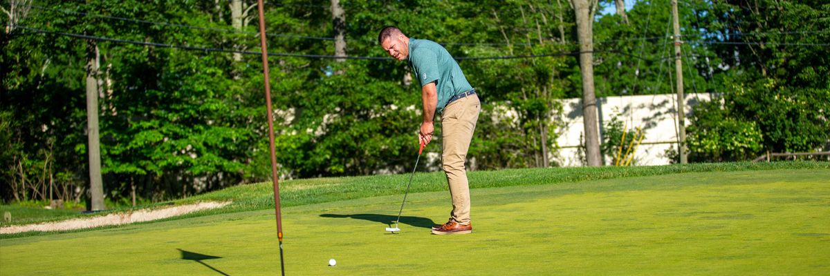 putting on a golf green